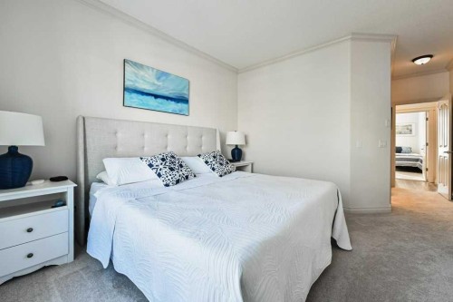 56 Discovery Woods Villas Sw, Calgary, AB - Indoor Photo Showing Bedroom