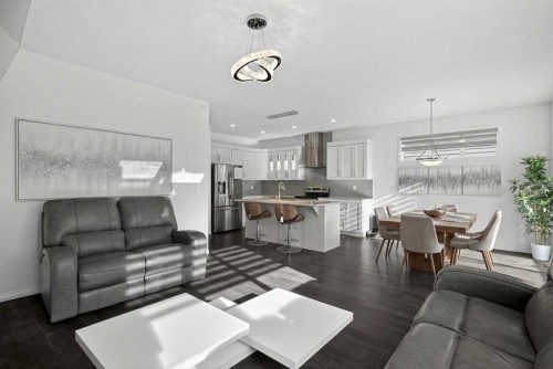 82 Osborne Common Sw, Airdrie, AB - Indoor Photo Showing Living Room