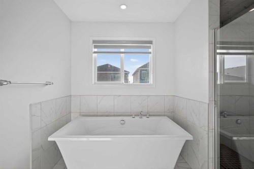 82 Osborne Common Sw, Airdrie, AB - Indoor Photo Showing Laundry Room