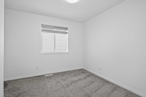 82 Osborne Common Sw, Airdrie, AB - Indoor Photo Showing Other Room