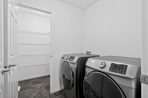 82 Osborne Common Sw, Airdrie, AB - Indoor Photo Showing Laundry Room