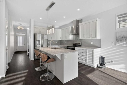 82 Osborne Common Sw, Airdrie, AB - Indoor Photo Showing Kitchen With Upgraded Kitchen