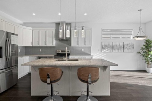 82 Osborne Common Sw, Airdrie, AB - Indoor Photo Showing Kitchen With Upgraded Kitchen