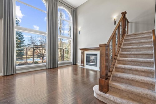 15 Cranleigh Way Se, Calgary, AB - Indoor Photo Showing Other Room With Fireplace