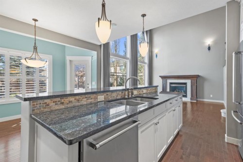 15 Cranleigh Way Se, Calgary, AB - Indoor Photo Showing Kitchen With Double Sink