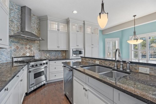15 Cranleigh Way Se, Calgary, AB - Indoor Photo Showing Kitchen With Double Sink With Upgraded Kitchen