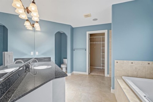 15 Cranleigh Way Se, Calgary, AB - Indoor Photo Showing Bathroom