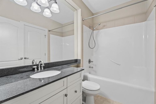 15 Cranleigh Way Se, Calgary, AB - Indoor Photo Showing Bathroom
