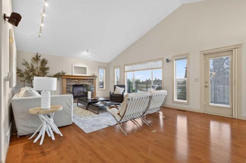 55 Billy Haynes Trail, Okotoks, AB - Indoor Photo Showing Living Room With Fireplace