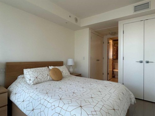 314-51 Waterfront Mews Sw, Calgary, AB - Indoor Photo Showing Bedroom