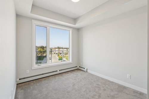 412-700 Shawnee Square Sw, Calgary, AB - Indoor Photo Showing Other Room
