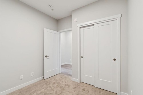 412-700 Shawnee Square Sw, Calgary, AB - Indoor Photo Showing Other Room