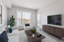 412-700 Shawnee Square Sw, Calgary, AB  - Indoor Photo Showing Living Room 