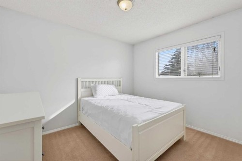 196 Deersaxon Circle Se, Calgary, AB - Indoor Photo Showing Bedroom