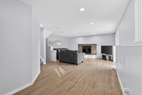 196 Deersaxon Circle Se, Calgary, AB - Indoor With Fireplace