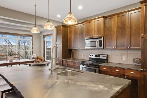 62 Chaparral Valley Grove Se, Calgary, AB - Indoor Photo Showing Kitchen With Double Sink