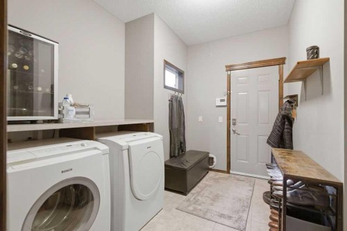 62 Chaparral Valley Grove Se, Calgary, AB - Indoor Photo Showing Laundry Room
