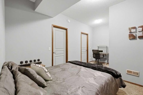 62 Chaparral Valley Grove Se, Calgary, AB - Indoor Photo Showing Bedroom