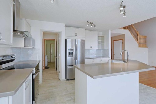 256 Hampstead Road Nw, Calgary, AB - Indoor Photo Showing Kitchen With Stainless Steel Kitchen With Double Sink With Upgraded Kitchen