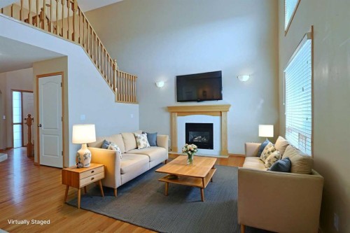 256 Hampstead Road Nw, Calgary, AB - Indoor Photo Showing Living Room With Fireplace