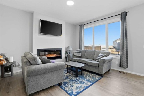 123 Cityside Crescent Ne, Calgary, AB - Indoor Photo Showing Living Room With Fireplace
