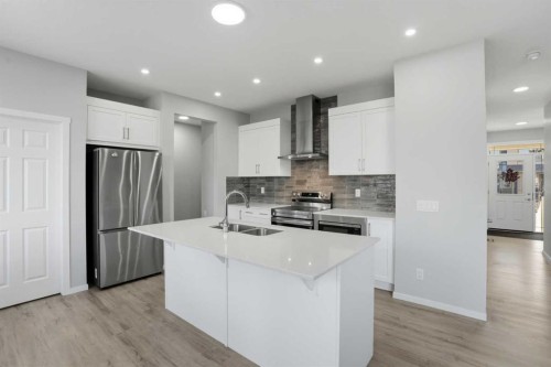 123 Cityside Crescent Ne, Calgary, AB - Indoor Photo Showing Kitchen With Stainless Steel Kitchen With Double Sink With Upgraded Kitchen