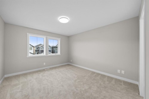 110 Sora Gardens Se, Calgary, AB - Indoor Photo Showing Other Room