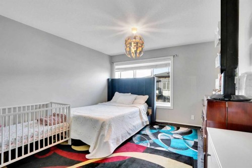231 Savanna Walk Ne, Calgary, AB - Indoor Photo Showing Bedroom