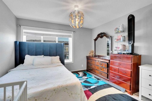 231 Savanna Walk Ne, Calgary, AB - Indoor Photo Showing Bedroom