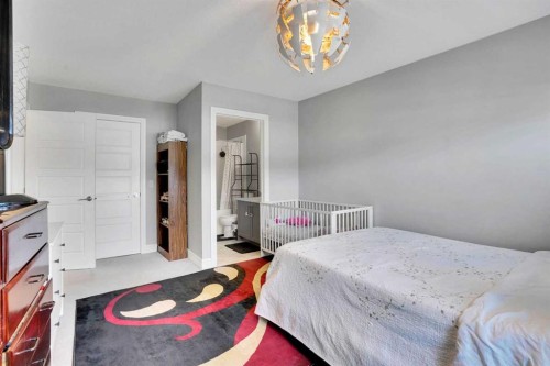 231 Savanna Walk Ne, Calgary, AB - Indoor Photo Showing Bedroom
