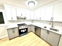 7620 27 Street Se, Calgary, AB  - Indoor Photo Showing Kitchen With Double Sink 