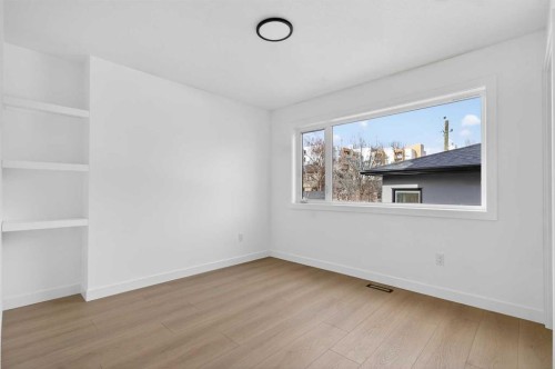 720 52 Avenue Sw, Calgary, AB - Indoor Photo Showing Other Room