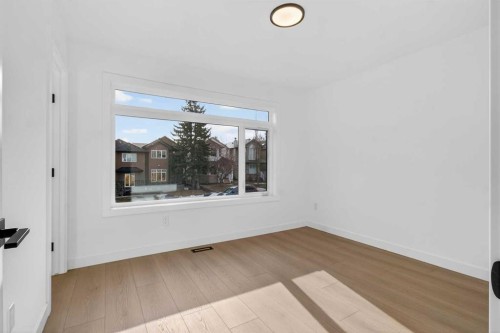 720 52 Avenue Sw, Calgary, AB - Indoor Photo Showing Other Room