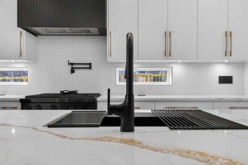 720 52 Avenue Sw, Calgary, AB - Indoor Photo Showing Kitchen With Double Sink