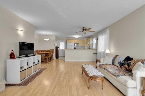 730 69 Avenue Sw, Calgary, AB - Indoor Photo Showing Living Room