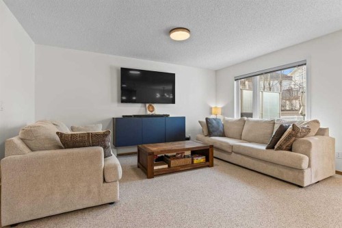 921 Cranston Drive Se, Calgary, AB - Indoor Photo Showing Living Room
