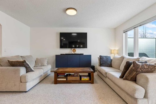 921 Cranston Drive Se, Calgary, AB - Indoor Photo Showing Living Room