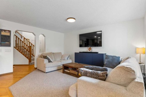 921 Cranston Drive Se, Calgary, AB - Indoor Photo Showing Living Room
