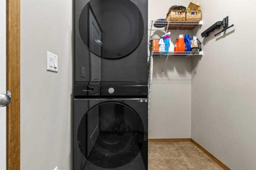 921 Cranston Drive Se, Calgary, AB - Indoor Photo Showing Laundry Room