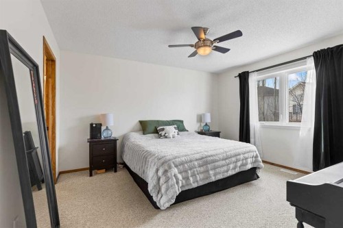921 Cranston Drive Se, Calgary, AB - Indoor Photo Showing Bedroom
