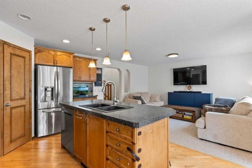 921 Cranston Drive Se, Calgary, AB - Indoor Photo Showing Kitchen With Stainless Steel Kitchen With Double Sink