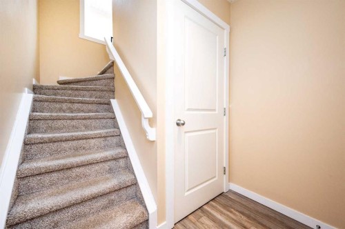 60 Covecreek Mews Ne, Calgary, AB - Indoor Photo Showing Other Room