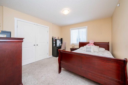 60 Covecreek Mews Ne, Calgary, AB - Indoor Photo Showing Bedroom
