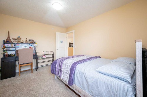 60 Covecreek Mews Ne, Calgary, AB - Indoor Photo Showing Bedroom