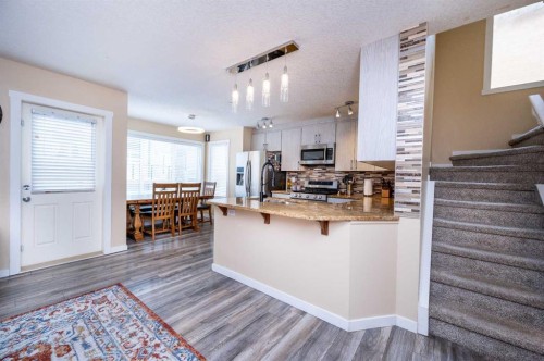 60 Covecreek Mews Ne, Calgary, AB - Indoor Photo Showing Kitchen With Upgraded Kitchen