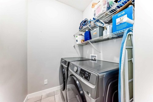 199 Kinniburgh Road, Chestermere, AB - Indoor Photo Showing Laundry Room
