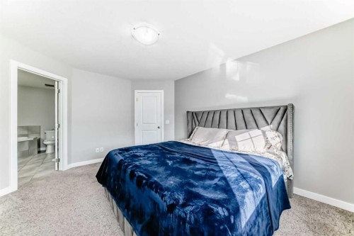 199 Kinniburgh Road, Chestermere, AB - Indoor Photo Showing Bedroom