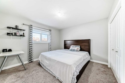 199 Kinniburgh Road, Chestermere, AB - Indoor Photo Showing Bedroom