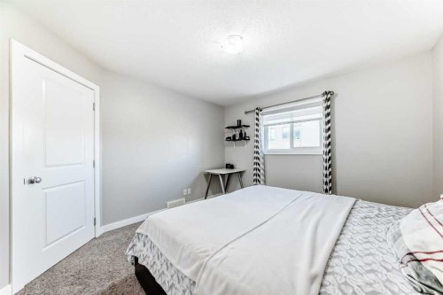 199 Kinniburgh Road, Chestermere, AB - Indoor Photo Showing Bedroom