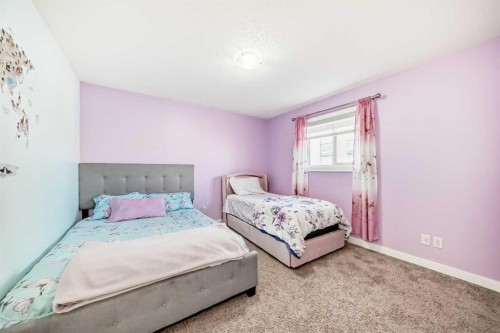 199 Kinniburgh Road, Chestermere, AB - Indoor Photo Showing Bedroom